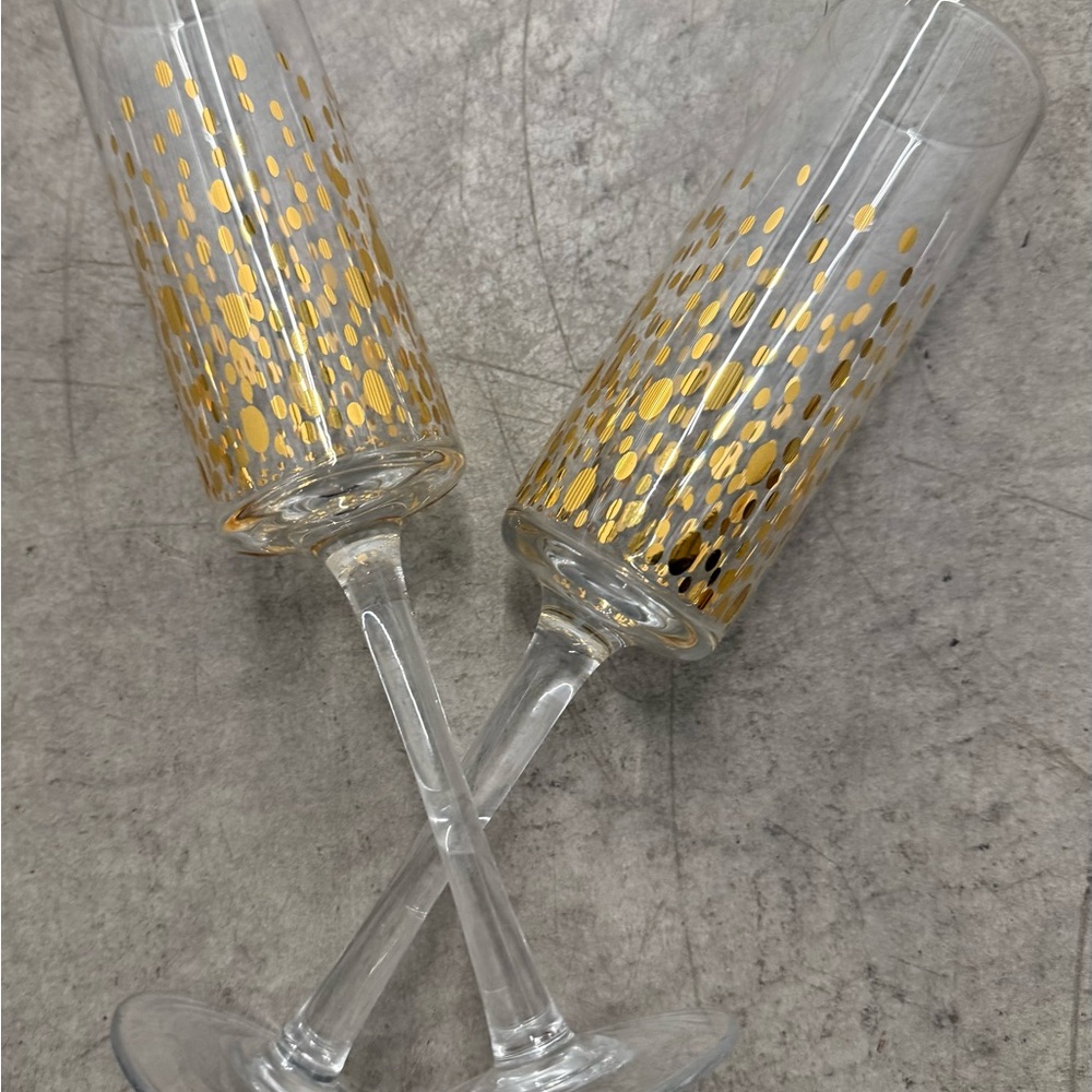 Set of 2 Unbranded Champagne Glasses with Gold Colored Embellishment.